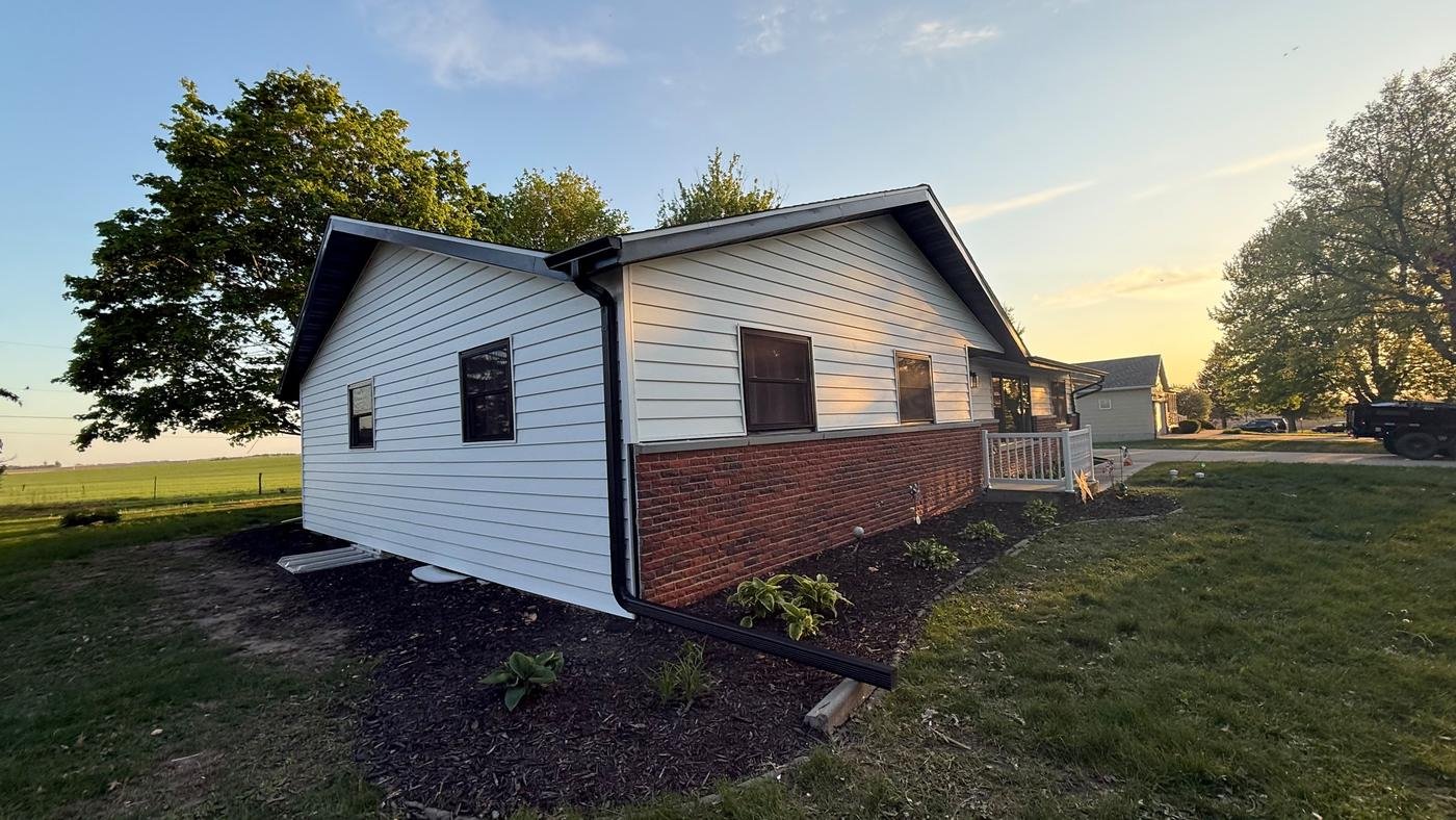 Newly finished residential home by MGS Construction at sunset